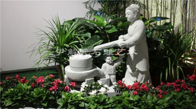 Women and children grinding stone